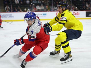 Sweden Anton Frondell (16) checks Czechia defenseman Jakub Fibigr (7) during the first period of an IIHF World Junior Hockey Championship gold medal game, Monday, Jan. 5, 2026, in St. Paul, Minn. (AP Photo/Matt Krohn)