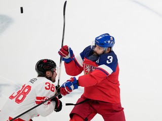 Canada's Brandon Hagel, left, challenges Czechia's Radko Gudas during a preliminary round match of men's ice hockey between Czech Republic and Canada at the 2026 Winter Olympics, in Milan, Italy, Thursday, Feb. 12, 2026. (AP Photo/Petr David Josek)

- 2026 Winter Olympic Games;Winter Olympic games;Olympic games;Sports;Events;XXV Olympiad;Olympics 2026;Milan Cortina Olympics;Winter Olympics 2026;Milan Cortina Winter Olympics;2026 Milan Cortina Olympic Games;Olympics;Winter Games