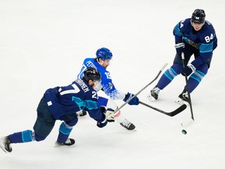 Finland's Kaapo Kakko, right, and Finland's Eetu Luostarinen, left, challenge Italy's Alex Petan during a preliminary round match of men's ice hockey between Finland and Italy at the 2026 Winter Olympics, in Milan, Italy, Saturday, Feb. 14, 2026. (AP Photo/Hassan Ammar)
- 2026 Winter Olympic Games;Winter Olympic games;Olympic games;Sports;Events;XXV Olympiad;Olympics 2026;Milan Cortina Olympics;Winter Olympics 2026;Milan Cortina Winter Olympics;2026 Milan Cortina Olympic Games;Olympics;Winter Games