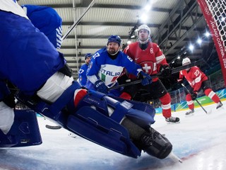 Italy's Mats Frycklund (67) challenges with Switzerland's Nico Hischier (13) during a men's ice hockey qualification playoff game between Switzerland and Italy at the 2026 Winter Olympics, in Milan, Italy, Tuesday, Feb. 17, 2026. (AP Photo/Darko Bandic, Pool)

- 2026 Winter Olympic Games;Winter Olympic games;Olympic games;Sports;Events;XXV Olympiad;Olympics 2026;Milan Cortina Olympics;Winter Olympics 2026;Milan Cortina Winter Olympics;2026 Milan Cortina Olympic Games;Olympics;Winter Games