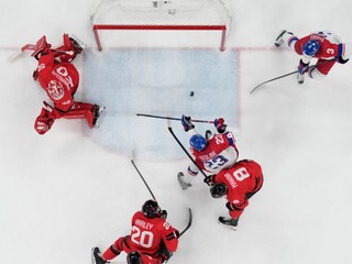 Czechia's Lukas Sedlak scores his side's opening goal during a men's ice hockey quarterfinal game between Canada and Czechia at the 2026 Winter Olympics, in Milan, Italy, Wednesday, Feb. 18, 2026. (AP Photo/Hassan Ammar)
- 2026 Winter Olympic Games;Winter Olympic games;Olympic games;Sports;Events;XXV Olympiad;Olympics 2026;Milan Cortina Olympics;Winter Olympics 2026;Milan Cortina Winter Olympics;2026 Milan Cortina Olympic Games;Olympics;Winter Games