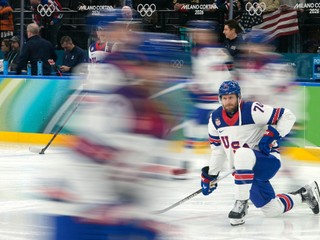 United States' Jaccob Slavin warms up before a men's ice hockey semifinal game between the United States and Slovakia at the 2026 Winter Olympics, in Milan, Italy, Friday, Feb. 20, 2026. (AP Photo/Hassan Ammar)

- 2026 Winter Olympic Games;Winter Olympic games;Olympic games;Sports;Events;XXV Olympiad;Olympics 2026;Milan Cortina Olympics;Winter Olympics 2026;Milan Cortina Winter Olympics;2026 Milan Cortina Olympic Games;Olympics;Winter Games