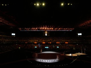 Spectators watch a pre-show ahead of the Olympic opening ceremony at the 2026 Winter Olympics, in Milan, Italy, Friday, Feb. 6, 2026. (AP Photo/Hassan Ammar)

- 2026 Winter Olympic Games;Winter Olympic games;Olympic games;Sports;Events;XXV Olympiad;Olympics 2026;Milan Cortina Olympics;Winter Olympics 2026;Milan Cortina Winter Olympics;2026 Milan Cortina Olympic Games;Olympics;Winter Games