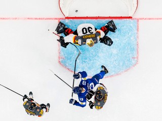 Germany's goaltender Philipp Grubauer, top, fails to save a goal by Finland's Anton Lundell, as Germany's Fabio Wagner, left, and Germany's Moritz Seider, right, vie with Finland's Jesse Puljujarvi, center,  during the Group A preliminary round game between Finland and Germany at the men's ice hockey world championship in Zurich, Switzerland, Friday, May 15, 2026. (Michael Buholzer/Keystone via AP)