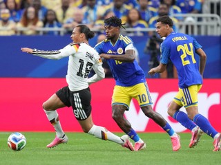 CuraĂ§ao's Leandro Bacuna pulls Germany's Leroy Sane during the World Cup Group E soccer match between Germany and Curacao in Houston, Sunday, June 14, 2026. (AP Photo/Eric Gay)

- Canada26
- Canada2026
- FIFA
- Mexico26
- Mexico2026
- soccer
- USA26
- USA2026
- worldcup
- worldcup26
- WorldCup2026
- futbol
- Canada26
- Canada2026
- FIFA
- Mexico26
- Mexico2026
- soccer
- USA26
- USA2026
- worldcup
- worldcup26
- WorldCup2026
- futbol