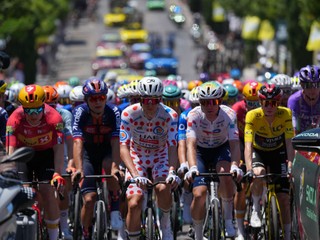 The pack rides during the second stage of the Tour de France cycling race over 168.5 kilometers (104.3 miles) with start in Tarragona and finish in Barcelona, Spain, Sunday, July 5, 2026. (AP Photo/Thibault Camus)