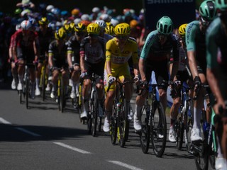 Slovenia's Tadej Pogacar, wearing the overall leader's yellow jersey, rides in the pack, during the fourth stage of the Tour de France cycling race over 181.9 kilometers (112.4 miles) with start in Carcassonne and finish in Foix, France, Tuesday, July 7, 2026. (AP Photo/Thibault Camus)