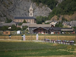 The pack rides during the nineteenth stage of the Tour de France cycling race with start in Gap and finish in Alpe d'Huez, France, Friday, July 24, 2026. (AP Photo/Mosa'ab Elshamy)