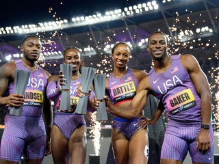 Ronnie Baker, Anavia Battle, Courtney Lindsey, and Kayla White, of the United States, pose after winning the mixed 4 X 100 meters relay final at the World Athletics Ultimate Championship in Budapest, Hungary, Friday, Sept. 11, 2026. (AP Photo/Matthias Schrader)