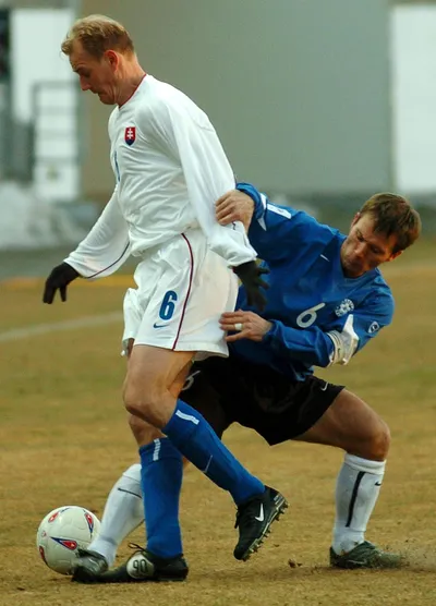 MUŽI A_EST_SVK_Miroslav Karhan_MartinReim6_Kvalifikácia MS 2006.jpg