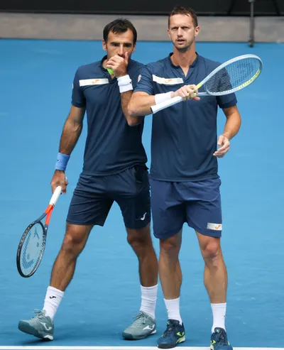 Ivan Dodig (vľavo) a Filip Polášek vo finále Australian Open 2021.