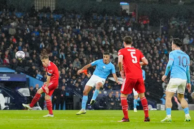 Manchester City's Rodrigo, second left, scores his side's opening goal during the Champions League quarterfinal, first leg, soccer match between Manchester City and Bayern Munich at the Etihad stadium in Manchester, England, Tuesday, April 11, 2023. (AP Photo/Jon Super)

- XCHAMPIONSLEAGUEX