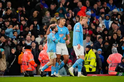 Manchester City's Rodrigo, center, celebrates with his teammates after scoring his side's opening goal during the Champions League quarterfinal, first leg, soccer match between Manchester City and Bayern Munich at the Etihad stadium in Manchester, England, Tuesday, April 11, 2023. (AP Photo/Jon Super)

- XCHAMPIONSLEAGUEX