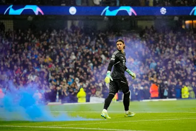 Bayern's goalkeeper Yann Sommer walks away from a smoke comes from flares lighted by Manchester City supporters after Manchester City's Rodrigo scores his side's opening goal during the Champions League quarterfinal, first leg, soccer match between Manchester City and Bayern Munich at the Etihad stadium in Manchester, England, Tuesday, April 11, 2023. (AP Photo/Jon Super)

- XCHAMPIONSLEAGUEX