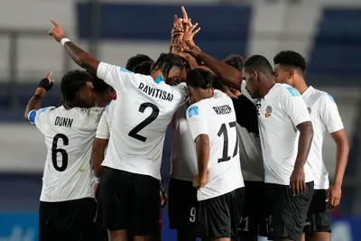 Fiji players gather together before the start of the second half during a FIFA U-20 World Cup Group B soccer match against Slovakia at the Bicentenario stadium in San Juan, Argentina, Saturday, May 20, 2023. (AP Photo/Natacha Pisarenko)