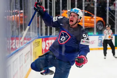 France's Tim Bozon celebrates after scoring the opening goal during the group A match between France and Austria at the ice hockey world championship in Tampere, Finland, Saturday, May 13, 2023. (AP Photo/Pavel Golovkin)