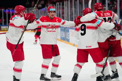 Denmark's team players celebrate as Nikolaj Ehlers scored the opening goal during the group A match between Hungary and Denmark at the ice hockey world championship in Tampere, Finland, Saturday, May 13, 2023. (AP Photo/Pavel Golovkin)