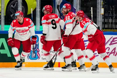 Denmark's Nikolaj Ehlers, left, celebrates with teammates after scoring his side's second goal during the group A match between Hungary and Denmark at the ice hockey world championship in Tampere, Finland, Saturday, May 13, 2023. (AP Photo/Pavel Golovkin)