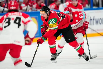 Hungary's Vilmos Gallo controls the puck during the group A match between Hungary and Denmark at the ice hockey world championship in Tampere, Finland, Saturday, May 13, 2023. (AP Photo/Pavel Golovkin)