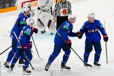 United States Nick Bonino, centre, celebrates with teammates after scoring his side's second goal during the group A match between United States and Hungary at the ice hockey world championship in Tampere, Finland, Sunday, May 14, 2023. (AP Photo/Pavel Golovkin)