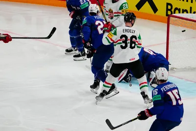 United States goalie Cal Petersen, centre, misses the opening goal by Hungary's Istvan Sofron during the group A match between United States and Hungary at the ice hockey world championship in Tampere, Finland, Sunday, May 14, 2023. (AP Photo/Pavel Golovkin)
