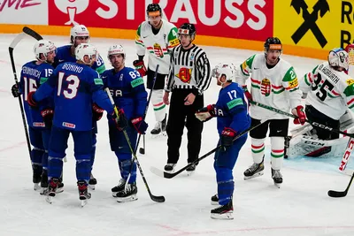 United States Nick Bonino, second from left back to the camera, celebrates with teammates after scoring his side's third goal during the group A match between United States and Hungary at the ice hockey world championship in Tampere, Finland, Sunday, May 14, 2023. (AP Photo/Pavel Golovkin)