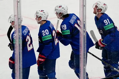 United States Cutter Gauthier, second from right, celebrates with teammates after scoring his side's fourth goal during the group A match between United States and Hungary at the ice hockey world championship in Tampere, Finland, Sunday, May 14, 2023. (AP Photo/Pavel Golovkin)