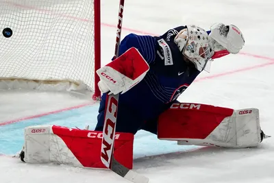 France's goalie Sebastian Ylonen misses Denmark's side's third goal by Nick Olesen during the group A match between France and Denmark at the ice hockey world championship in Tampere, Finland, Sunday, May 14, 2023. (AP Photo/Pavel Golovkin)