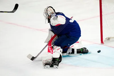 France's goalie Sebastian Ylonen fails to save Hungary's side's third goal by Istval Bartalis during the group A match between France and Hungary at the ice hockey world championship in Tampere, Finland, Tuesday, May 16, 2023. (AP Photo/Pavel Golovkin)