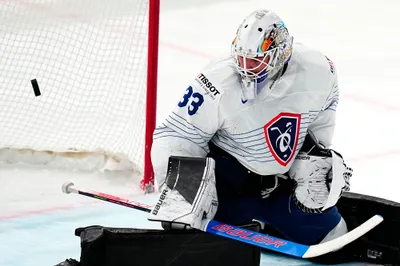 France's goalie Julian Junca misses Finland's side's third goal by Marko Antilla during the group A match between Finland and France at the ice hockey world championship in Tampere, Finland, Wednesday, May 17, 2023. (AP Photo/Pavel Golovkin)