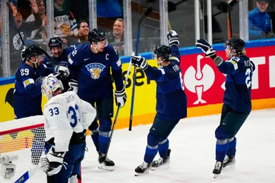 Finland's Marko Antilla, centre left, celebrates with teammates after scoring his side's third goal during the group A match between Finland and France at the ice hockey world championship in Tampere, Finland, Wednesday, May 17, 2023. (AP Photo/Pavel Golovkin)