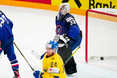 France's goalie Julian Junca misses Sweden's side's fourth goal by Fabian Zetterlund during the group A match between Sweden and France at the ice hockey world championship in Tampere, Finland, Saturday, May 20, 2023. (AP Photo/Pavel Golovkin)