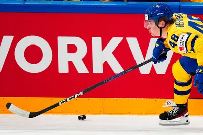 Sweden's Jonatan Berggren controls the puck during the group A match between Sweden and France at the ice hockey world championship in Tampere, Finland, Saturday, May 20, 2023. (AP Photo/Pavel Golovkin)