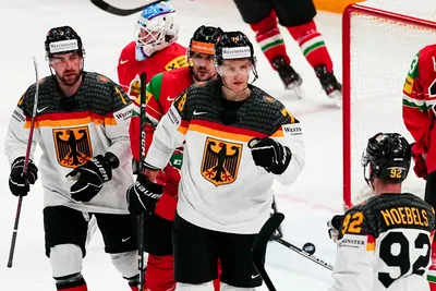 Germany's Nico Sturm celebrates after scoring his side's fourth goal during the group A match between Germany and Hungary at the ice hockey world championship in Tampere, Finland, Sunday, May 21, 2023. (AP Photo/Pavel Golovkin)