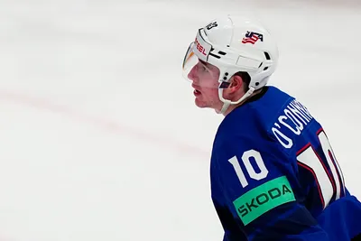 United States Drew O'Connor celebrates after scoring the opening goal during the group A match between United States and France at the ice hockey world championship in Tampere, Finland, Sunday, May 21, 2023. (AP Photo/Pavel Golovkin)