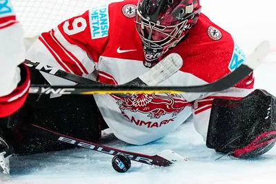 Denmark's goalie George Sorensen makes a save during the group A match between Denmark and Sweden at the ice hockey world championship in Tampere, Finland, Monday, May 22, 2023. (AP Photo/Pavel Golovkin)