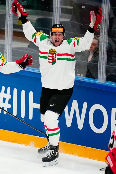 Hungary's Istvan Sofron celebrates after scoring his side's second goal during the group A match between Austria and Hungary at the ice hockey world championship in Tampere, Finland, Monday, May 22, 2023. (AP Photo/Pavel Golovkin)