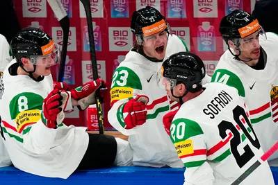 Hungary's Istvan Sofron celebrates after scoring the opening goal during the group A match between Austria and Hungary at the ice hockey world championship in Tampere, Finland, Monday, May 22, 2023. (AP Photo/Pavel Golovkin)