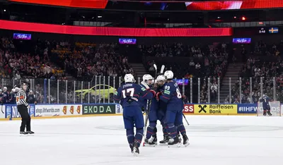 Team USA celebrates after scoring to 1-1 during the 2023 IIHF Ice Hockey World Championships preliminary round group A match between Sweden and USA in Tampere, Finland, Tuesday, May 23, 2023. (Emmi Korhonen/Lehtikuva via AP)

- .
