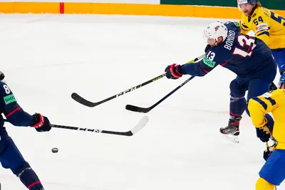 United States Nick Bonino, right centre, scores his side's first goal during the group A match between Sweden and United States at the ice hockey world championship in Tampere, Finland, Tuesday, May 23, 2023. (AP Photo/Pavel Golovkin)