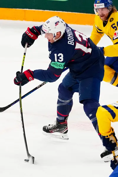 United States Nick Bonino, centre, scores his side's first goal during the group A match between Sweden and United States at the ice hockey world championship in Tampere, Finland, Tuesday, May 23, 2023. (AP Photo/Pavel Golovkin)