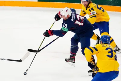 United States Nick Bonino, centre, scores his side's first goal during the group A match between Sweden and United States at the ice hockey world championship in Tampere, Finland, Tuesday, May 23, 2023. (AP Photo/Pavel Golovkin)