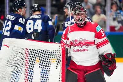 Denmark's goalie George Sorensen reacts after Finland's Ville Pokka scored his side's third goal during the group A match between Finland and Denmark at the ice hockey world championship in Tampere, Finland, Tuesday, May 23, 2023. (AP Photo/Pavel Golovkin)