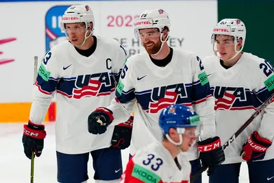 United States Nick Perbix, centre, celebrates with teammates after scoring his side's second goal during the quarterfinal match between United States and Czech Republic at the ice hockey world championship in Tampere, Finland, Thursday, May 25, 2023. (AP Photo/Pavel Golovkin)