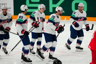 United States' Nick Perbix, second right, celebrates with teammates after scoring his side's second goal during the quarterfinal match between United States and Czech Republic at the ice hockey world championship in Tampere, Finland, Thursday, May 25, 2023. (AP Photo/Pavel Golovkin)