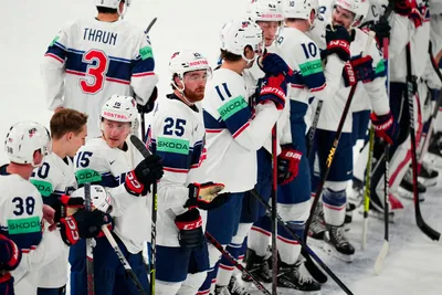 United States Nick Perbix, centre left, celebrate with teammates as they won the quarterfinal match between United States and Czech Republic at the ice hockey world championship in Tampere, Finland, Thursday, May 25, 2023. (AP Photo/Pavel Golovkin)