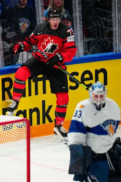 Canada's Samuel Blais celebrates after scoring his side's second goal past Finland's goalie Emil Larmi during the quarterfinal match between Canada and Finland at the ice hockey world championship in Tampere, Finland, Thursday, May 25, 2023. (AP Photo/Pavel Golovkin)