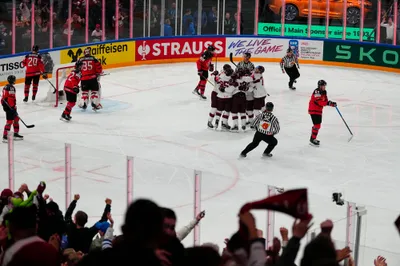 Latvia celebrates a goal during the semifinal match against Canada at the Ice Hockey World Championship in Tampere, Finland, Saturday, May 27, 2023. (AP Photo/Pavel Golovkin)