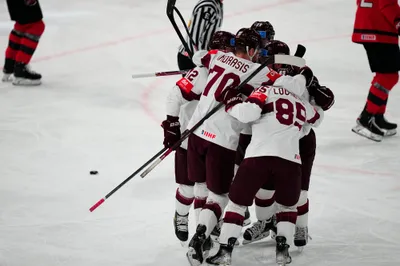 Latvia celebrates a goal during the semifinal match against Canada at the Ice Hockey World Championship in Tampere, Finland, Saturday, May 27, 2023. (AP Photo/Pavel Golovkin)