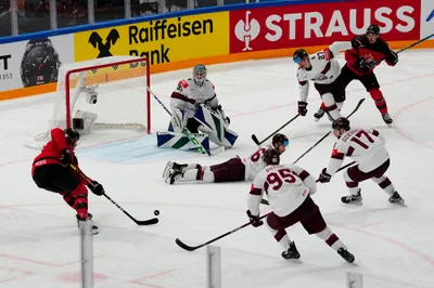 Latvia's goalie Arturs Silovs (31) defends the net during their semifinal match against Canada at the Ice Hockey World Championship in Tampere, Finland, Saturday, May 27, 2023. (AP Photo/Pavel Golovkin)